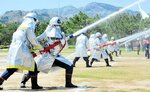 全町分団 初の一斉放水 香美で消防団出初め式