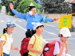 橋本さん(米子)総理大臣表彰 児童の登校見守り40年