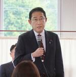 首相、規正法の今国会改正を約束