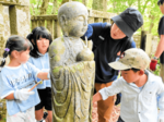 参道で地蔵磨き「笑顔に」 大山でフェス