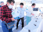 来場者に会場の清掃を呼びかけ JT社員ら、活動の一環 Sea級グルメin境港
